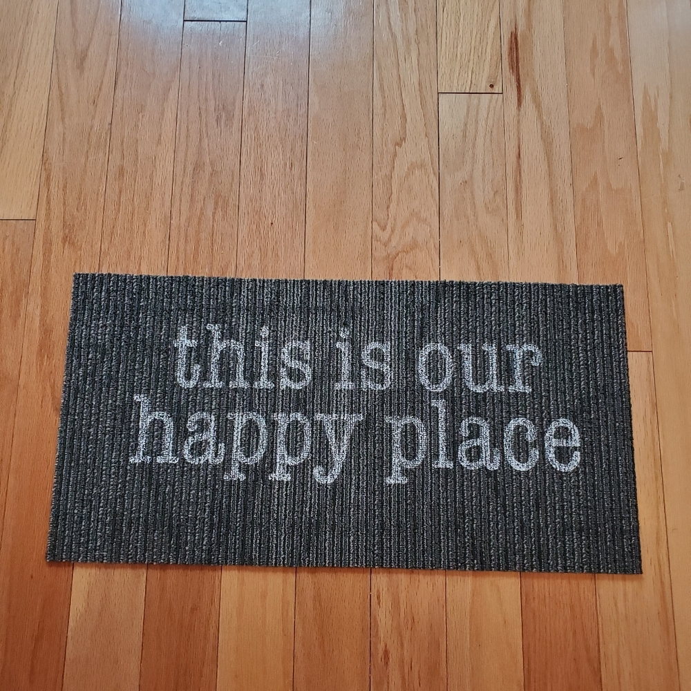 "This is our happy place rug"